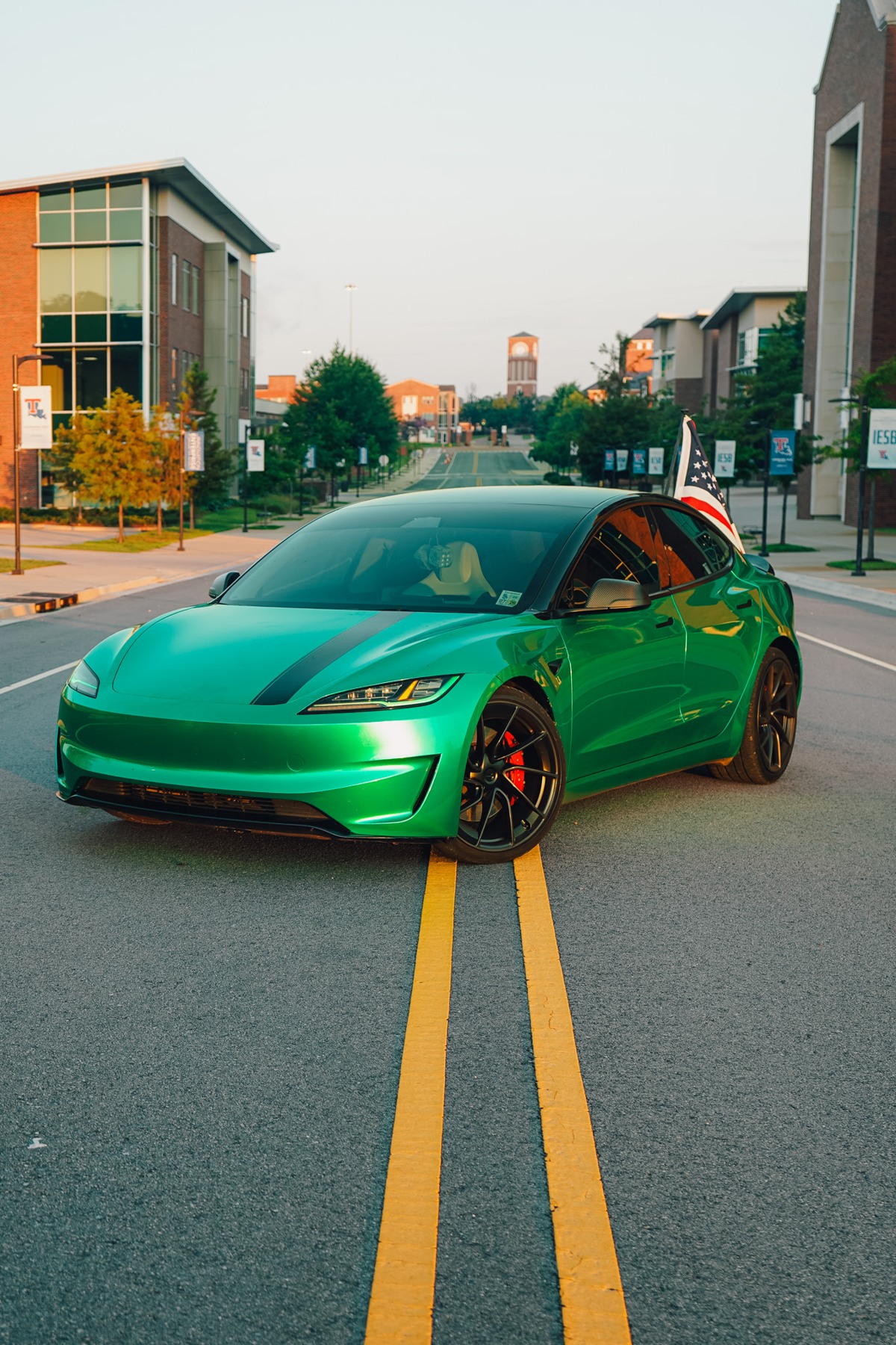 Tesla Model 3 wrapped in BMW Isle of Man Green